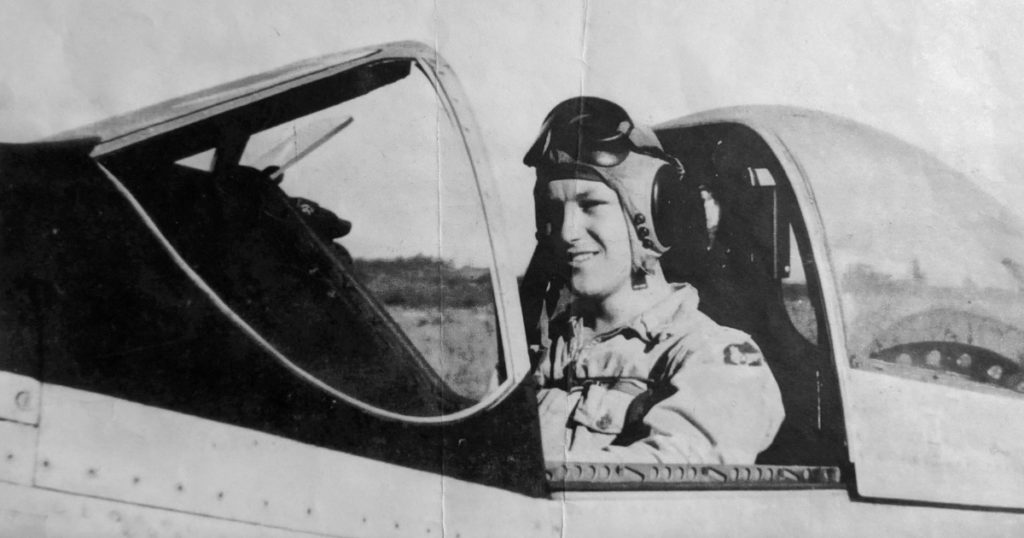 Photo of Francis Rodgers in the cockpit of a fighter aircraft.
